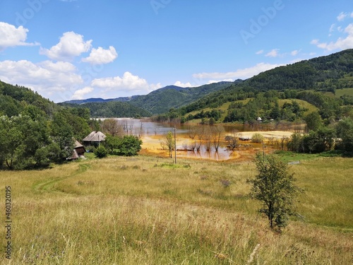Artificial lake formed in Geamana Village, Alba county, Romania, for depositing the toxic waste from a mine operation near Rosia Montana. photo