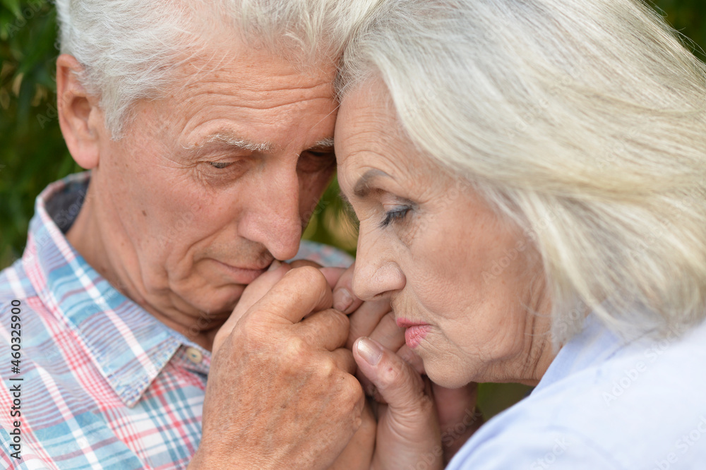 Portrait of unhappy senior couple in the park Portrait of unhappy senior couple in the park