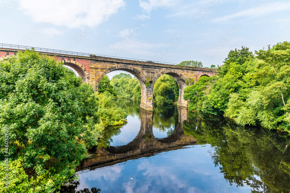 A view from the road brdige towards the railway viaduct at Yarm, Yorkshire, UK in summertime
