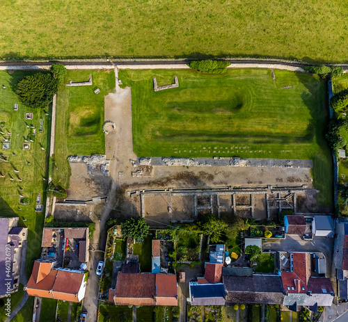 An aerial view over the ruins of a Roman fort in a field outside Piercebridge, UK in summertime photo