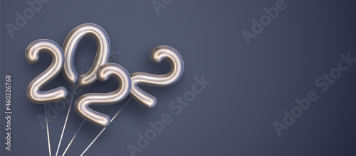 Bundle of 2022 balloon number on blue background.