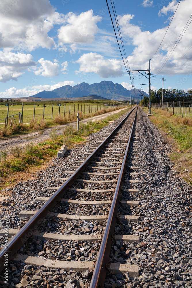 Railroad running through farm fields near Stellenbosch, South Africa.