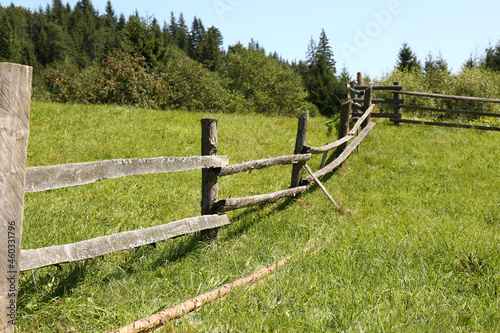 Beautiful view of mountain countryside with wooden fence