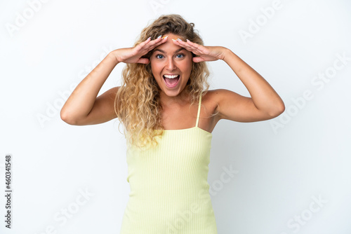 Girl with curly hair isolated on white background with surprise expression