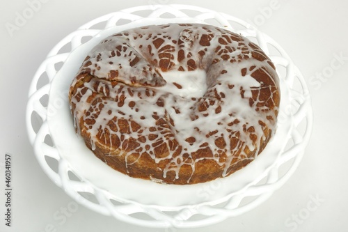 Closeup of Danish Kringle pastry on white plate photo