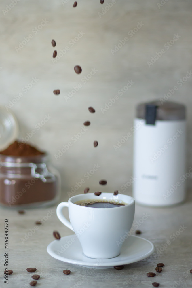 Embark on a caffeinated journey as aromatic coffee beans float down towards a steaming cup, with a modern grinder and chocolate spread to complement. Embark on a caffeinated journey as aromatic coffee beans float down towards a steaming cup, with a modern grinder and chocolate spread to complement.