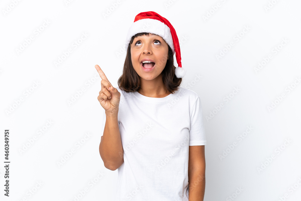 Young mixed race woman celebrating Christmas isolated on white background pointing up and surprised Young mixed race woman celebrating Christmas isolated on white background pointing up and surprised