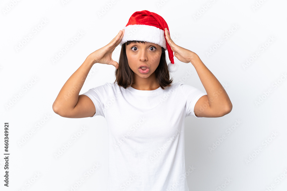 Young mixed race woman celebrating Christmas isolated on white background with surprise expression