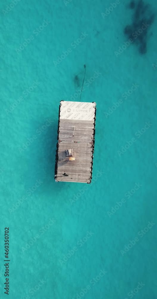 Aerial view of floating platform on turquoise sea. High quality 4k footage Aerial view of floating platform on turquoise sea. High quality 4k footage