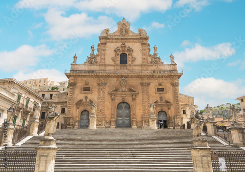 Modica (Sicilia, Italy) - A historical center view of the touristic baroque city in province of Ragusa, Sicily island, during the hot summer photo