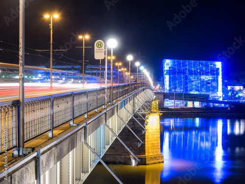  ARS Electronica Center in Linz, Nibelungen Bridge and Danube, Austria, illuminated at night photo