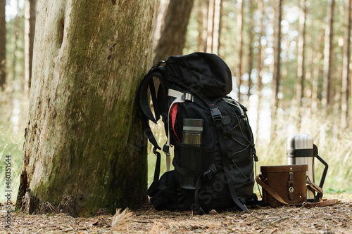 Traveler's backpack with supplies on the ground