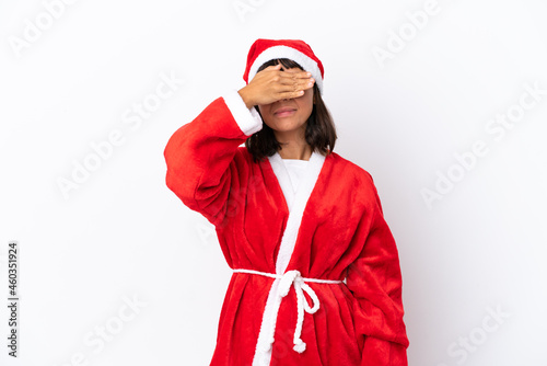 Young mixed race woman disguised as Santa Claus isolated on white background covering eyes by hands. Do not want to see something