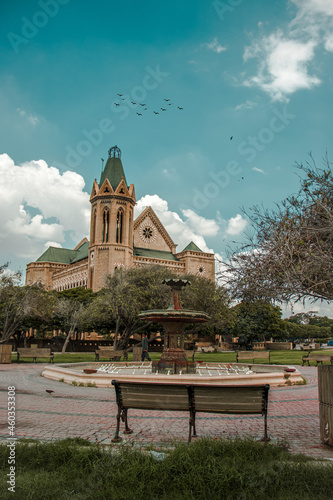 A beautiful picture of Frere Hall British Building on a Cloudy Day in karachi pakistan. photo