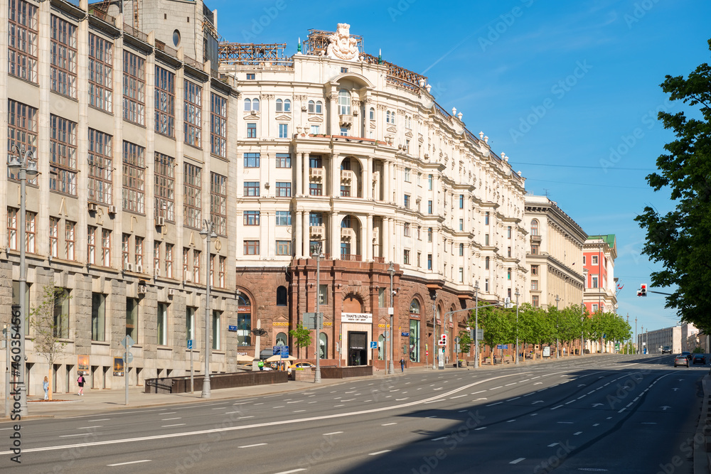 Moscow,  View on Tverskaya Street. Russian neoclassical & eclectic architecture and urban car traffic on an early summer morning