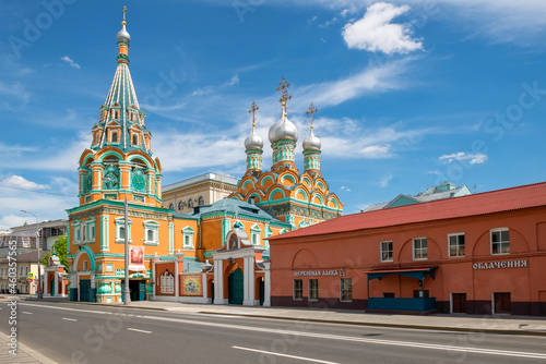 Moscow, Temple of St. Gregory of Neocaesarea in Darbitz. Bright red green sanctuary in the city center. Old historical building built in 1668 photo