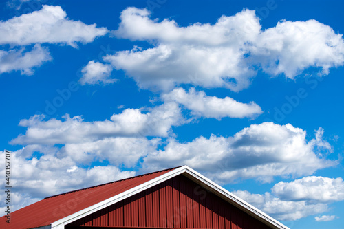 Red Roof of a Barn with sky in the background  © BeeBatch