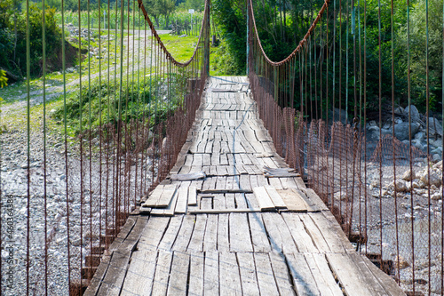 suspension bridge over the Inguri river in Svaneti in Georgia photo