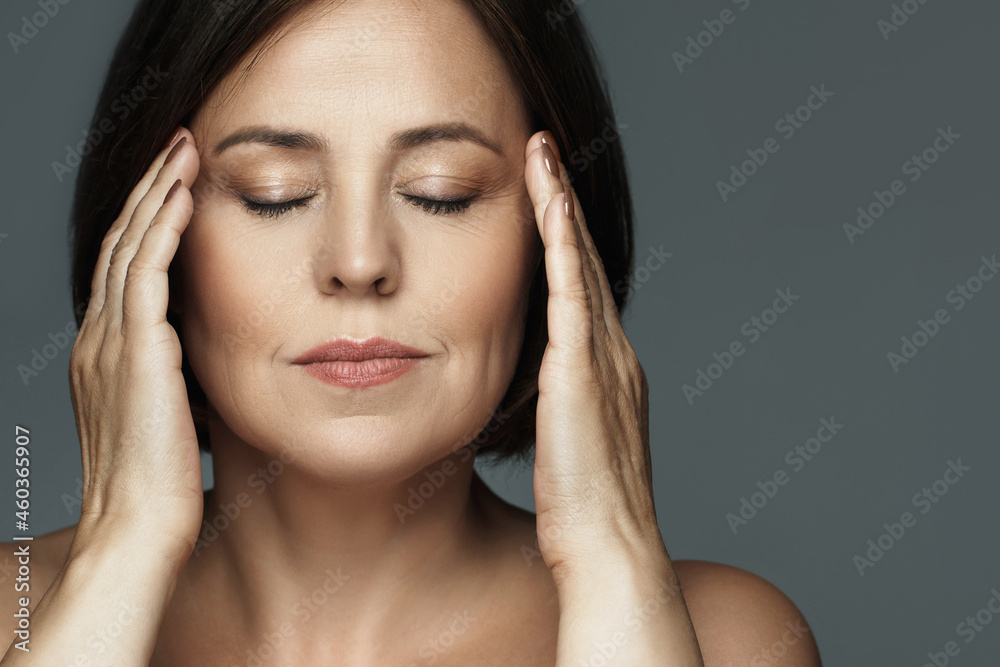 Beautiful middle aged woman with closed eyes Beautiful middle aged woman with closed eyes