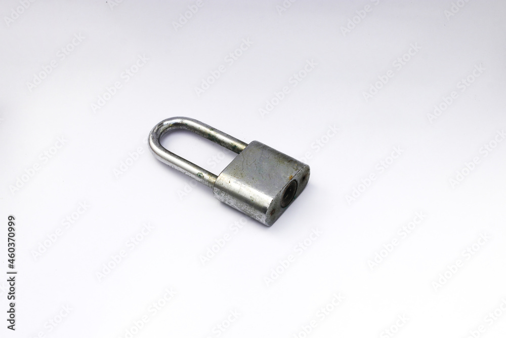 Old used padlock isolated on white background