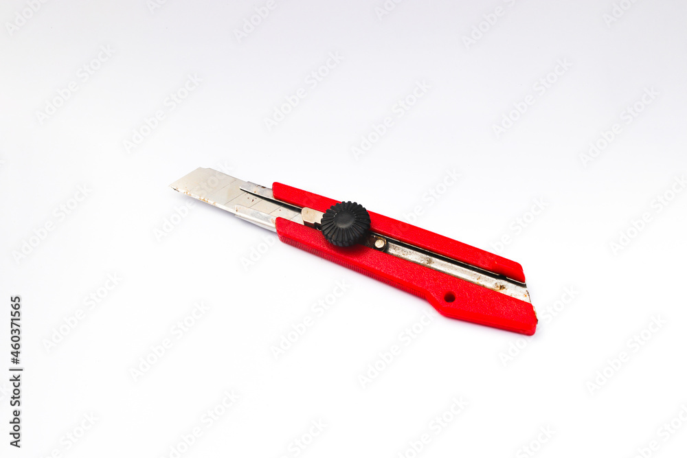 Red Cutter Knife isolated on white background. stock photo. Red Cutter Knife isolated on white background. stock photo.