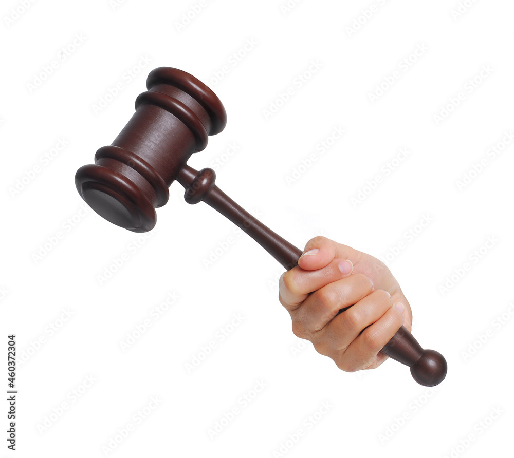 Judge hand hold a judment trial wood hammer on white background. Judge hand hold a judment trial wood hammer on white background.