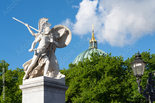 Berlin Cathedral (Berliner Dom) and marble statue on the Schlossbrücke