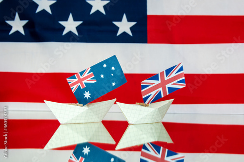 ships with flags of Australia, United States and United Kingdom as new military alliance security pact between countries