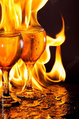 Two glasses and a flame