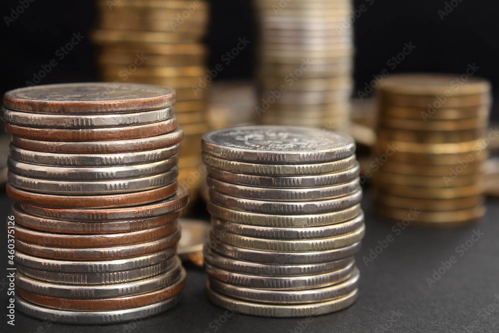 stacks of coins close up on black background stacks of coins close up on black background