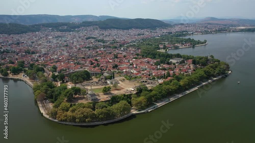 Aerial drone video of iconic castle and ancinet citadel of Ioannina featuring Byzantine Museum, Its Kale Acropolis, Fetiche Mosque and Ali Pasha's tomb, Epirus, Greece photo