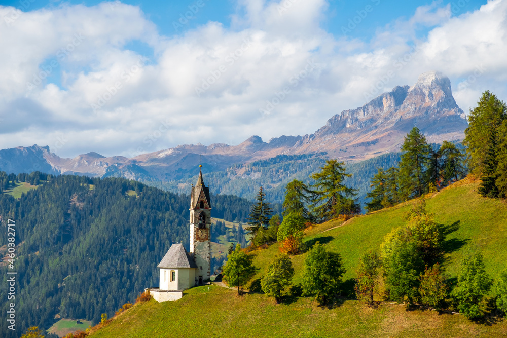Church of Santa Barbara during the day in the cozy little village of La Valle, Alta Badia, South Tyrol