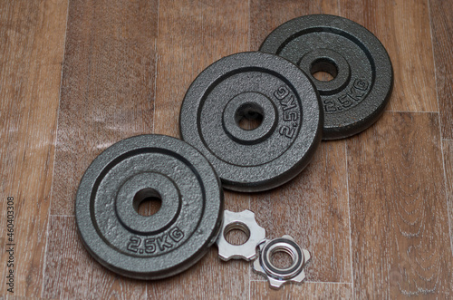 sports pancakes made of metal for dumbbells. Active lifestyle.