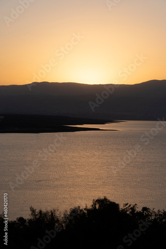 Orange sunrise reflecting off of the Dead Sea. High quality photo