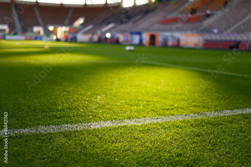 Grass at the football stadium during sunny afternoon
