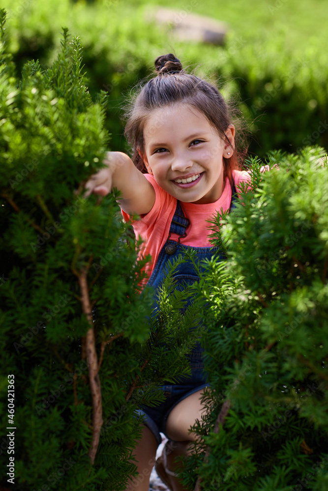 portrait of happy child girl in the park portrait of happy child girl in the park
