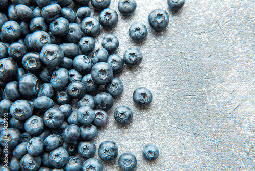 Blueberries on concrete background