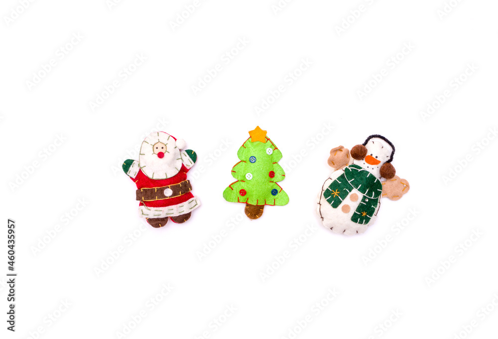 Layout santa claus, snowman, felt Christmas toys isolate on a white background. Christmas and New Year concept, place under the text. Flat lay Christmas