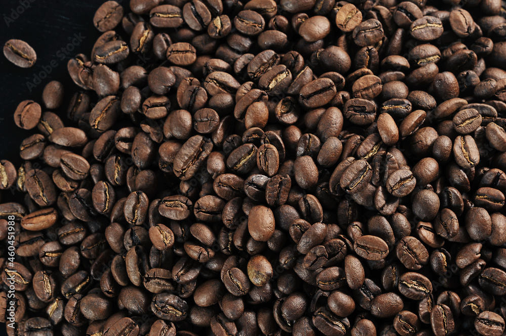 Obraz premium coffee beans - freshly roasted beans close-up photo