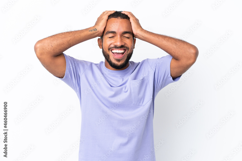 Young Ecuadorian man isolated on white background laughing