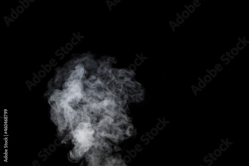 A white fumes, smoke on a black background to add to your pictures. Perfect smoke, steam, fragrance