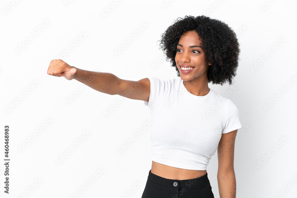 Young African American woman isolated on white background giving a thumbs up gesture