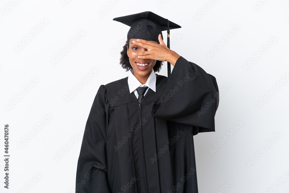Young university graduate African American woman isolated on white background covering eyes by hands and smiling Young university graduate African American woman isolated on white background covering eyes by hands and smiling