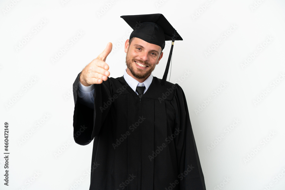 Young university Brazilian graduate isolated on white background shaking hands for closing a good deal Young university Brazilian graduate isolated on white background shaking hands for closing a good deal