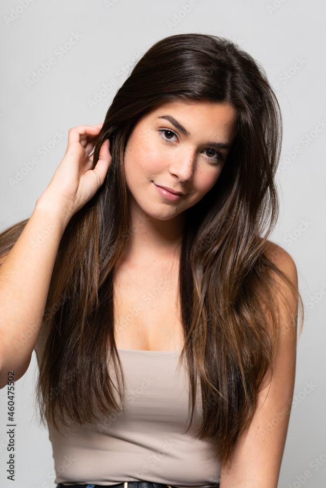 Teenager Brazilian girl over isolated background Teenager Brazilian girl over isolated background
