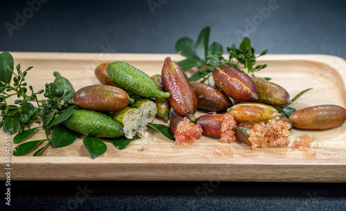 Fresh Australia finger limes or caviar limes, The finger lime is small, sausage-shaped citrus that comes in an assortment of colors