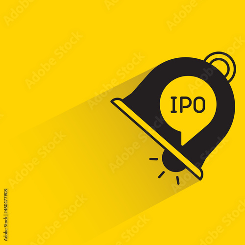 ipo ring bell with shadow on yellow background