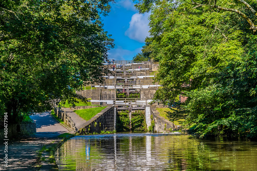 A view of the Five Locks network on the Leeds, Liverpool canal at Bingley, Yorkshire, UK in summertime photo
