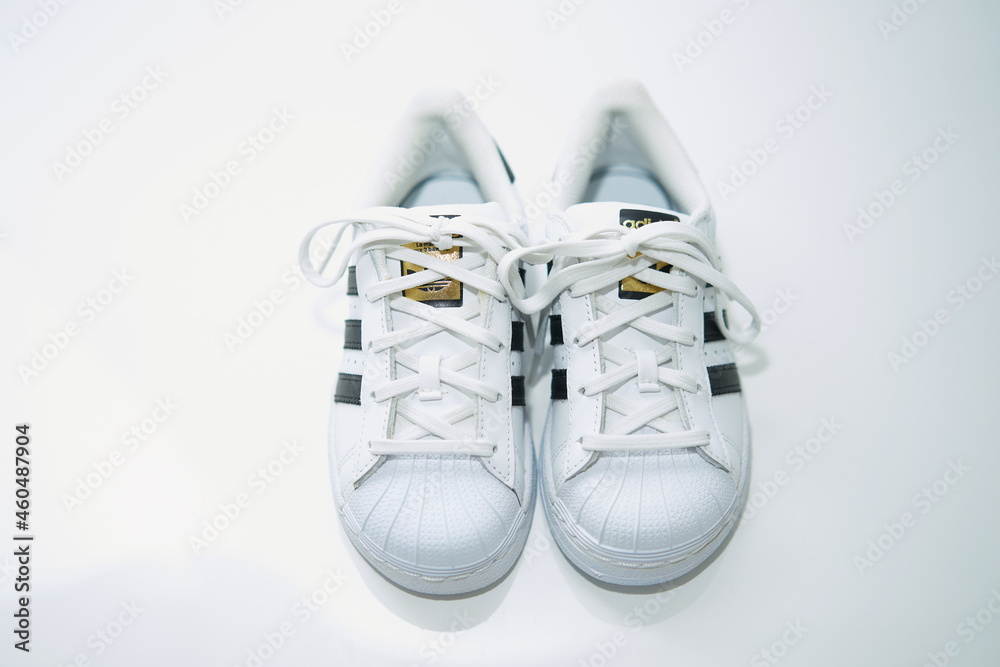 bangkok,Thailand,July 2,2021-original adidas sneakers shoes with shoelace  on floor front high angle view soft focus Stock Photo | Adobe Stock