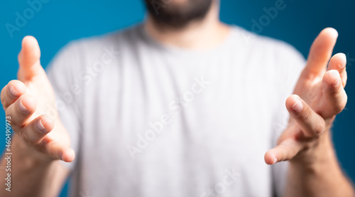 Hand pushing on a touch scr...
